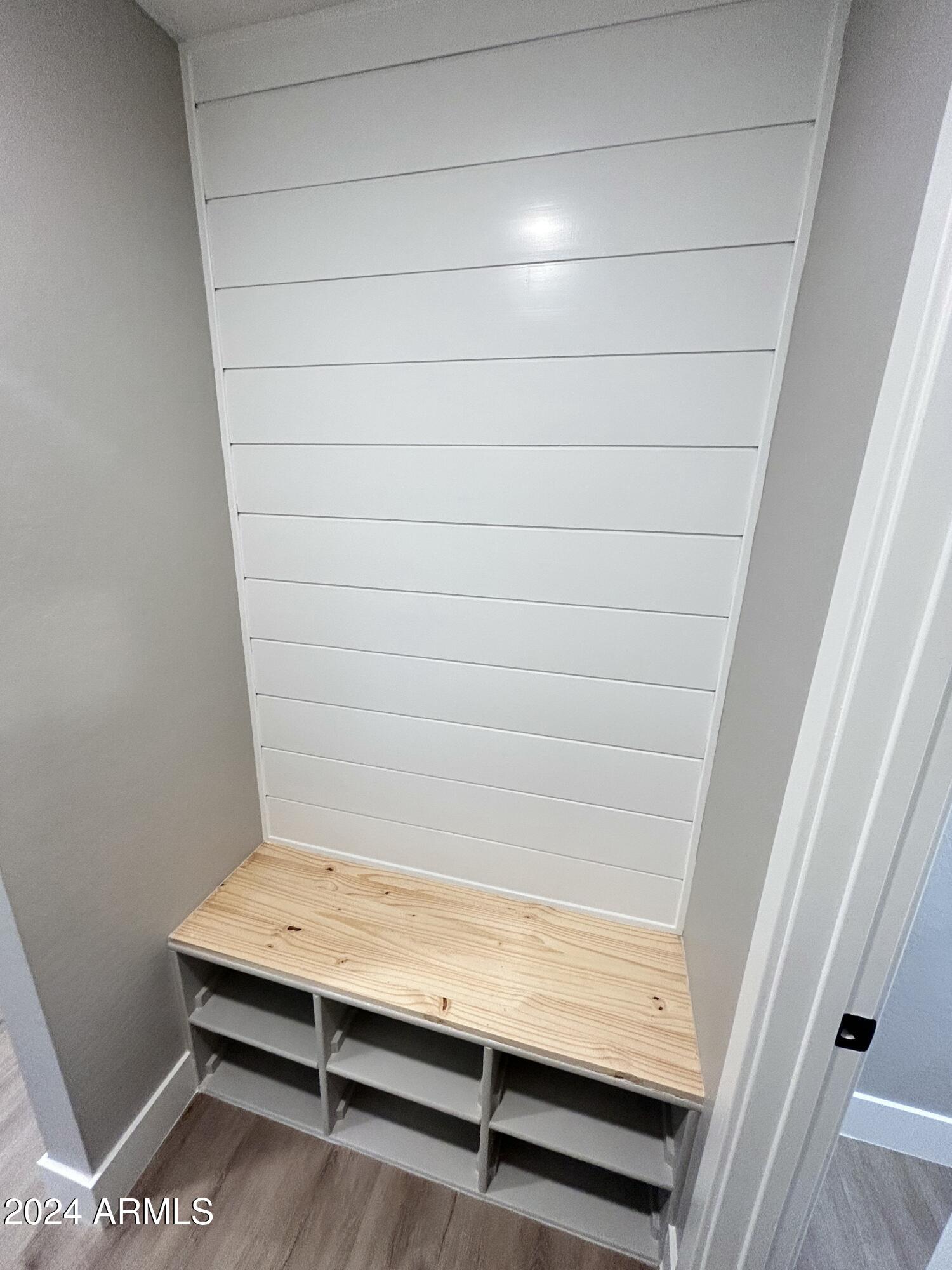 825 West Dobbins Road Phoenix, AZ 85041 - Photo 18 of 99 a view of small space with racks on the wall