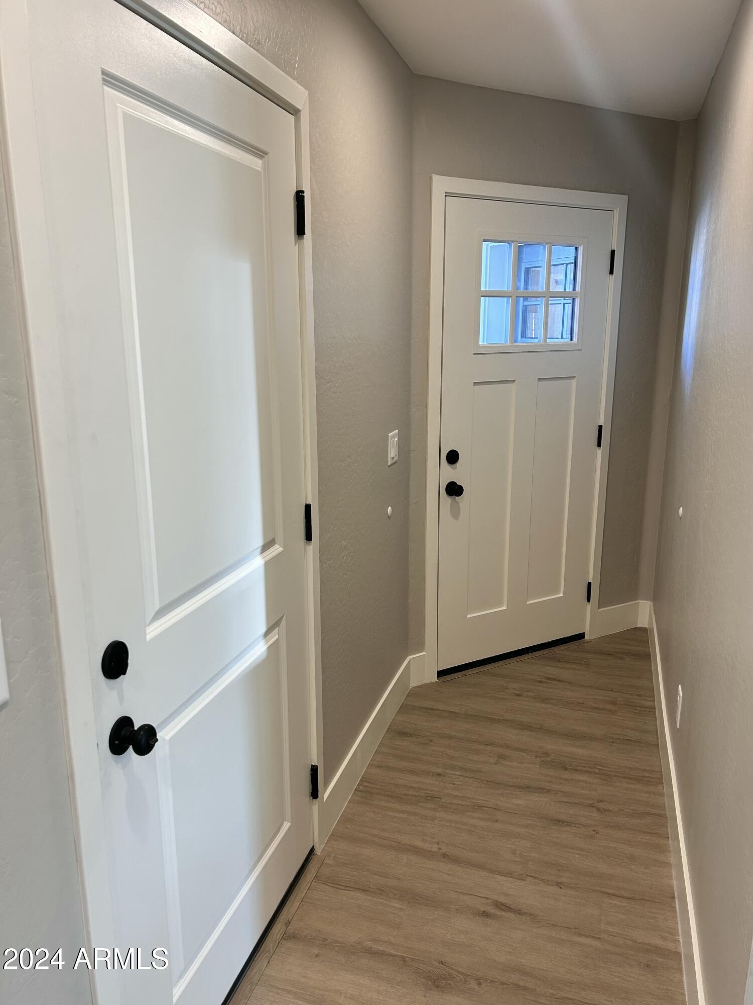 825 West Dobbins Road Phoenix, AZ 85041 - Photo 19 of 99 a view of a bathroom with wooden floor