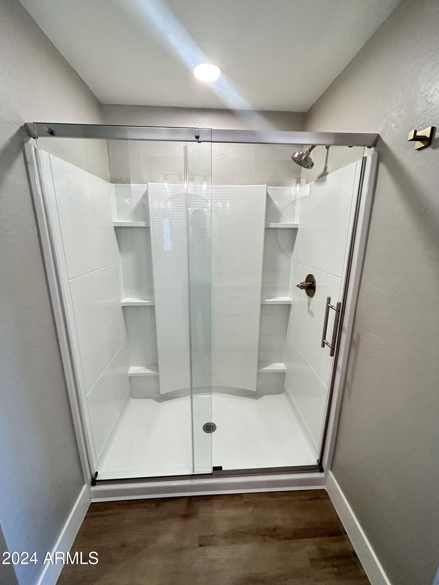 825 West Dobbins Road Phoenix, AZ 85041 - Photo 36 of 99 a view of walk in closet with empty racks