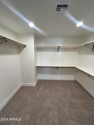 a kitchen with sink and window