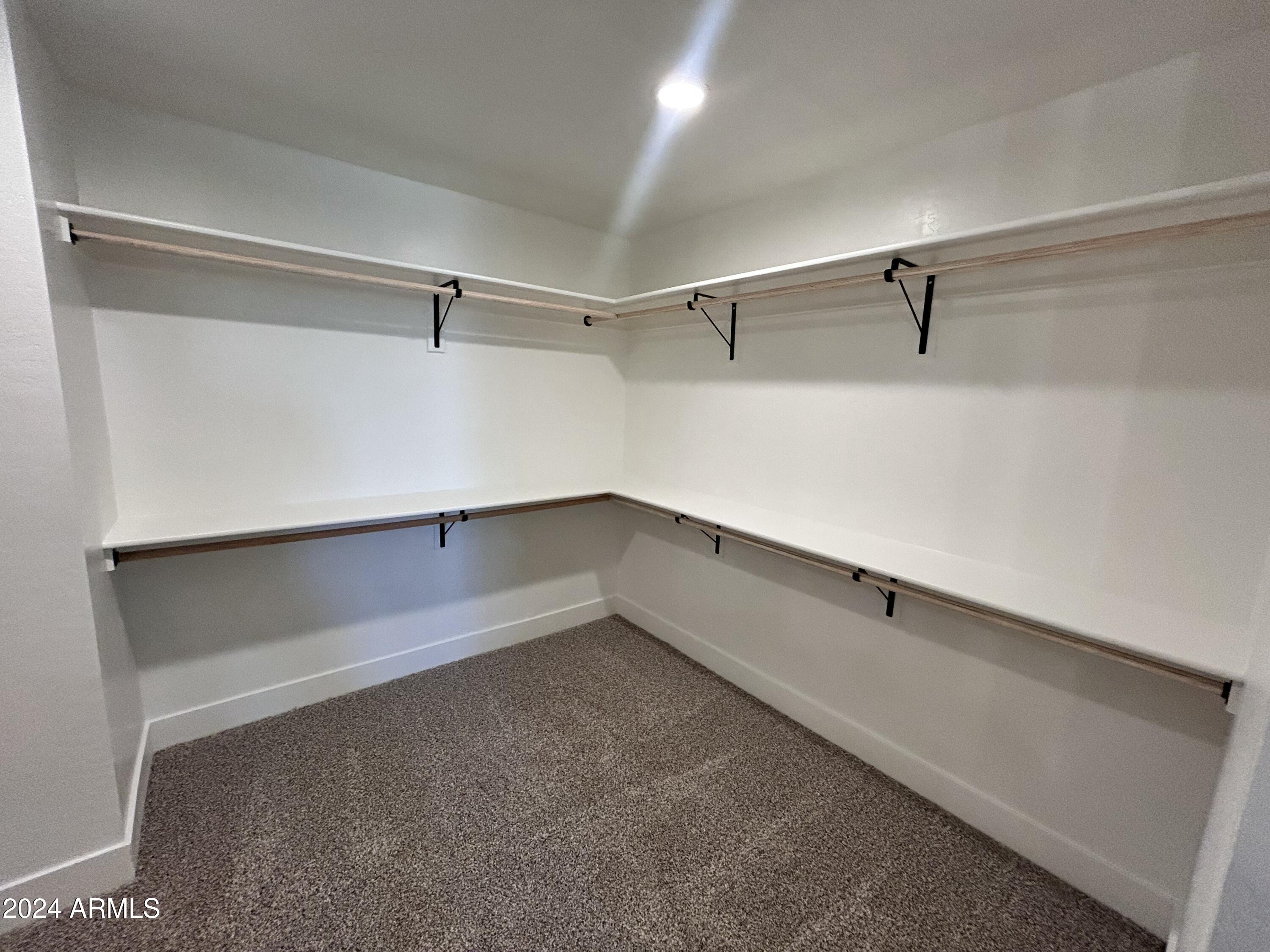 825 West Dobbins Road Phoenix, AZ 85041 - Photo 41 of 99 a view of an empty walk in closet