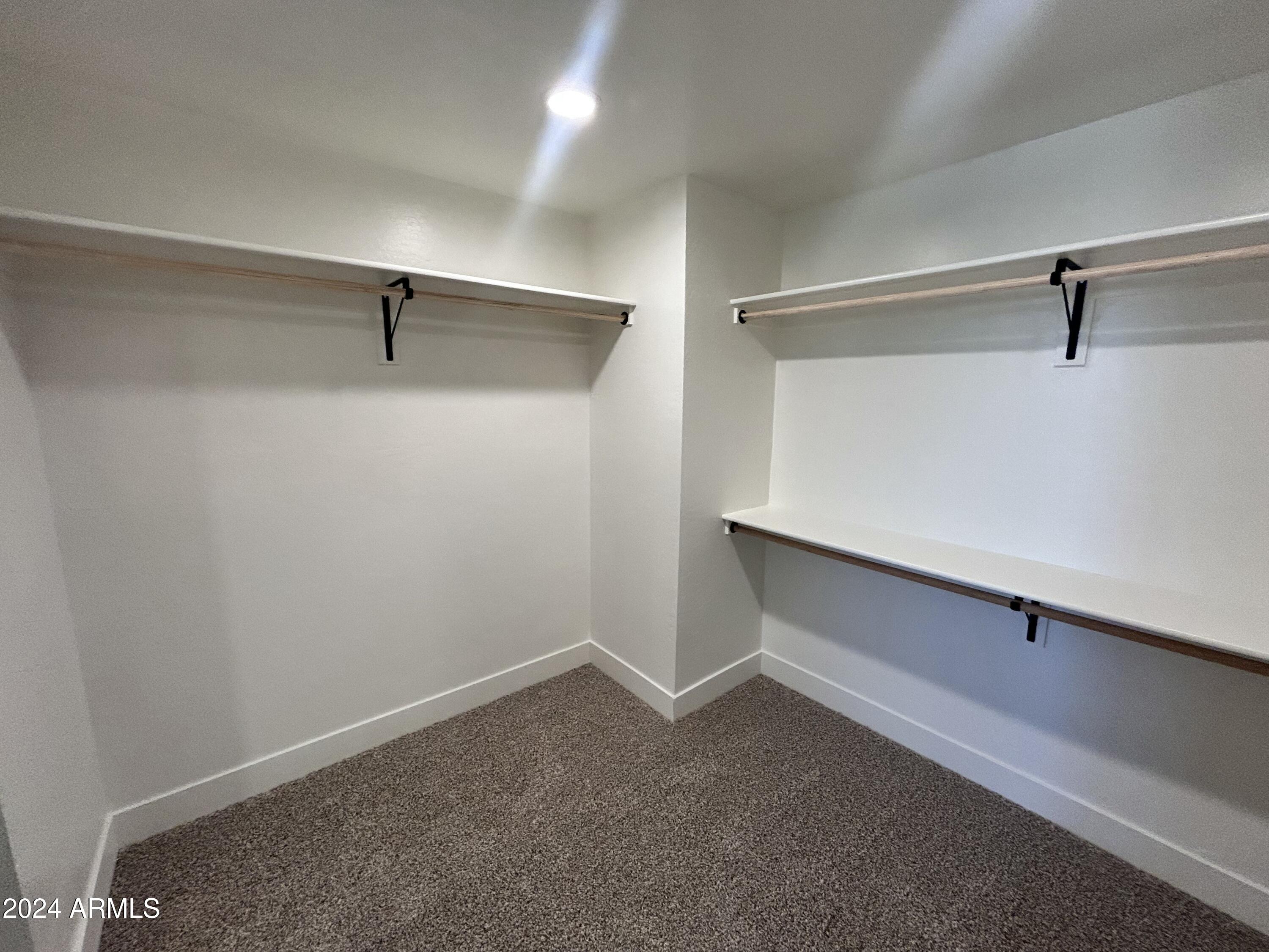825 West Dobbins Road Phoenix, AZ 85041 - Photo 42 of 99 a view of an empty walk in closet
