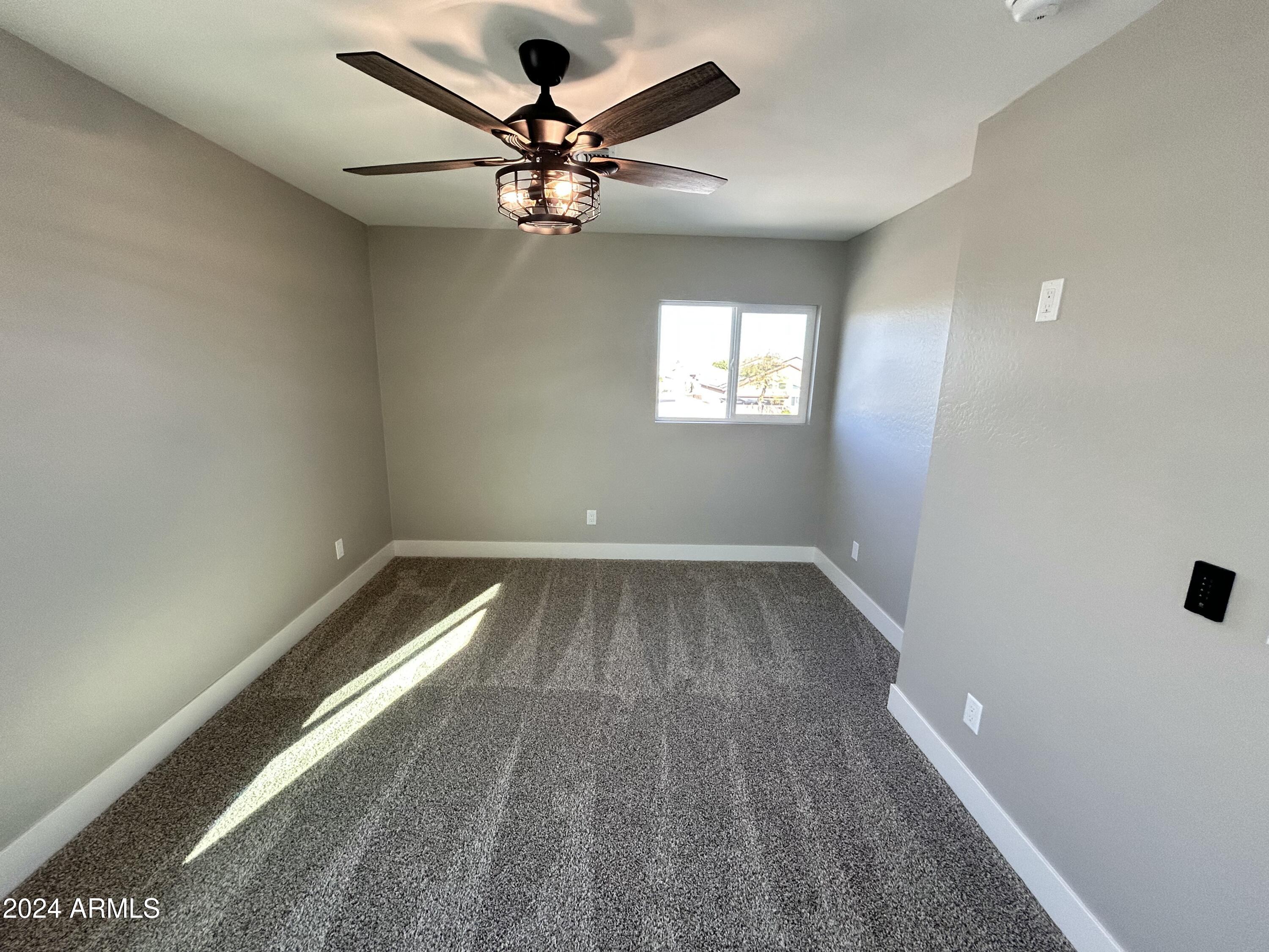 825 West Dobbins Road Phoenix, AZ 85041 - Photo 46 of 99 wooden floor in an empty room