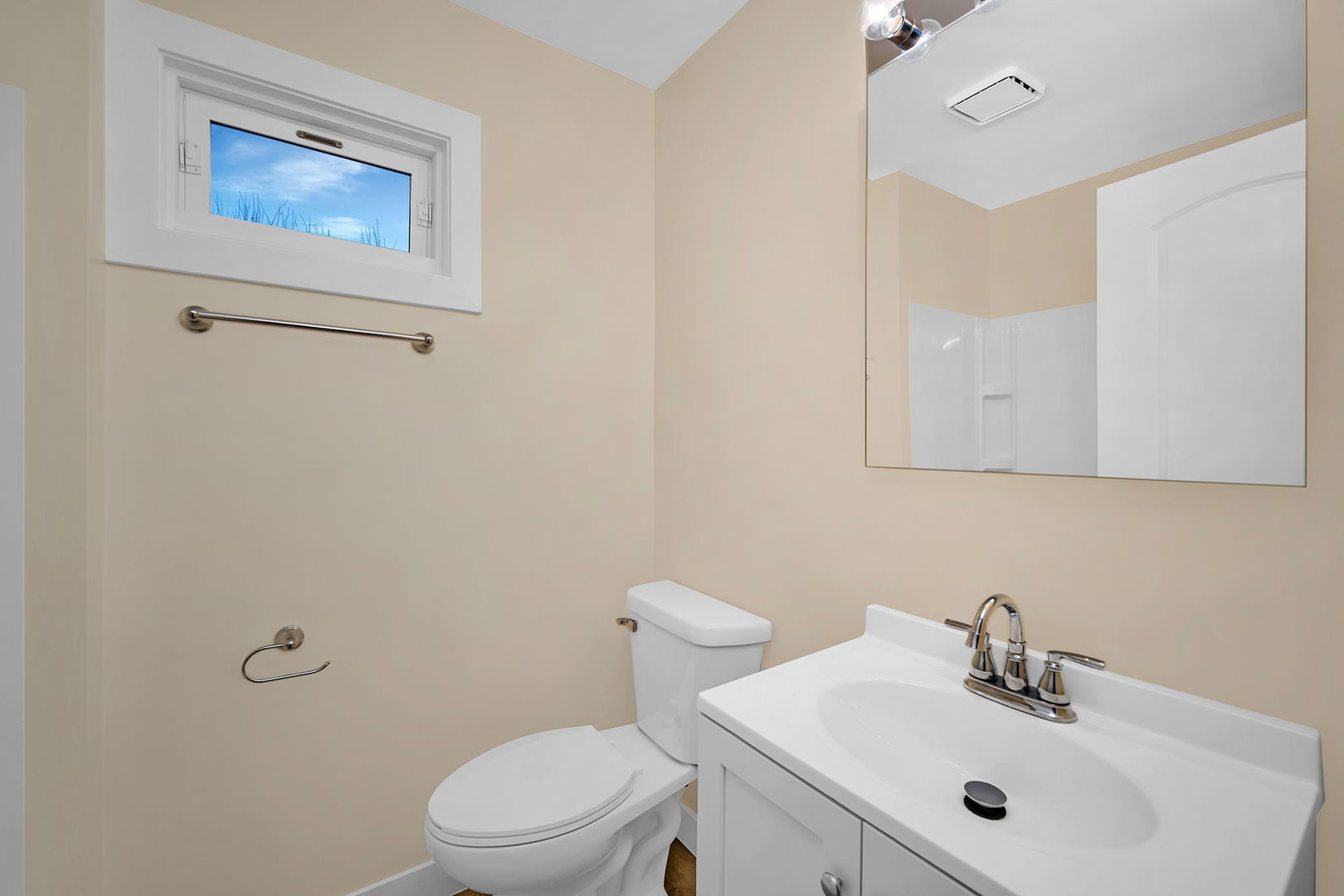 729 Claim Street Aurora, IL 60505 - Photo 25 of 34 a bathroom with a sink mirror and toilet
