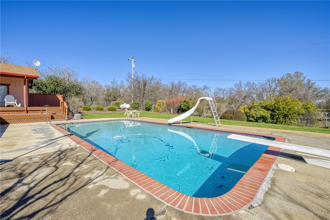 6535 Highland Springs Road Lakeport, CA 95453 - Photo 13 of 75 a view of a swimming pool with a lounge chair