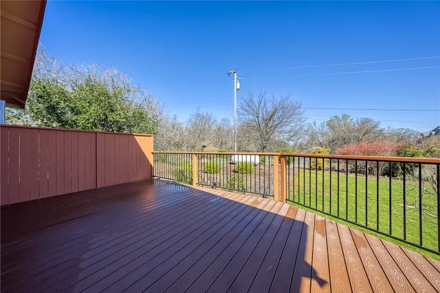 a view of a balcony with an outdoor space