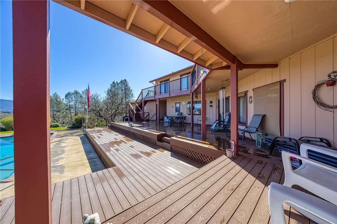 6535 Highland Springs Road Lakeport, CA 95453 - Photo 20 of 75 a view of balcony with chairs and wooden floor