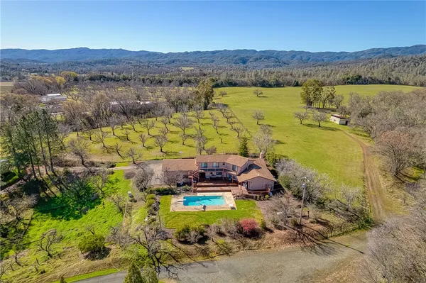 a view of a room with sliding door and wooden floor