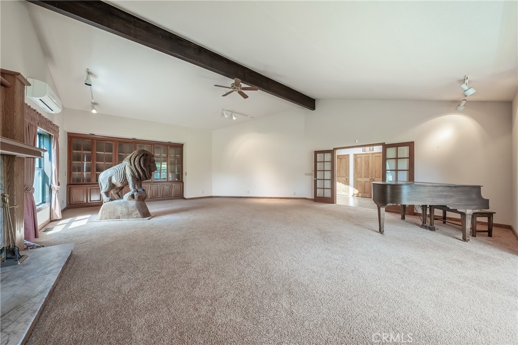 6535 Highland Springs Road Lakeport, CA 95453 - Photo 39 of 75 a view of a livingroom with furniture and a ceiling fan