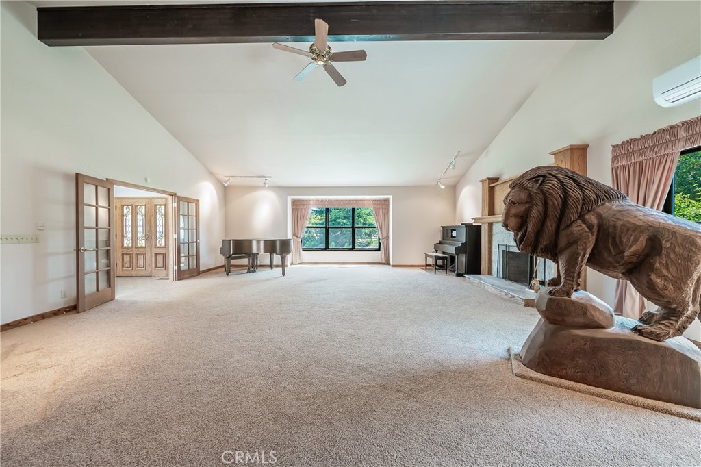 6535 Highland Springs Road Lakeport, CA 95453 - Photo 41 of 75 a view of a livingroom with furniture and a ceiling fan