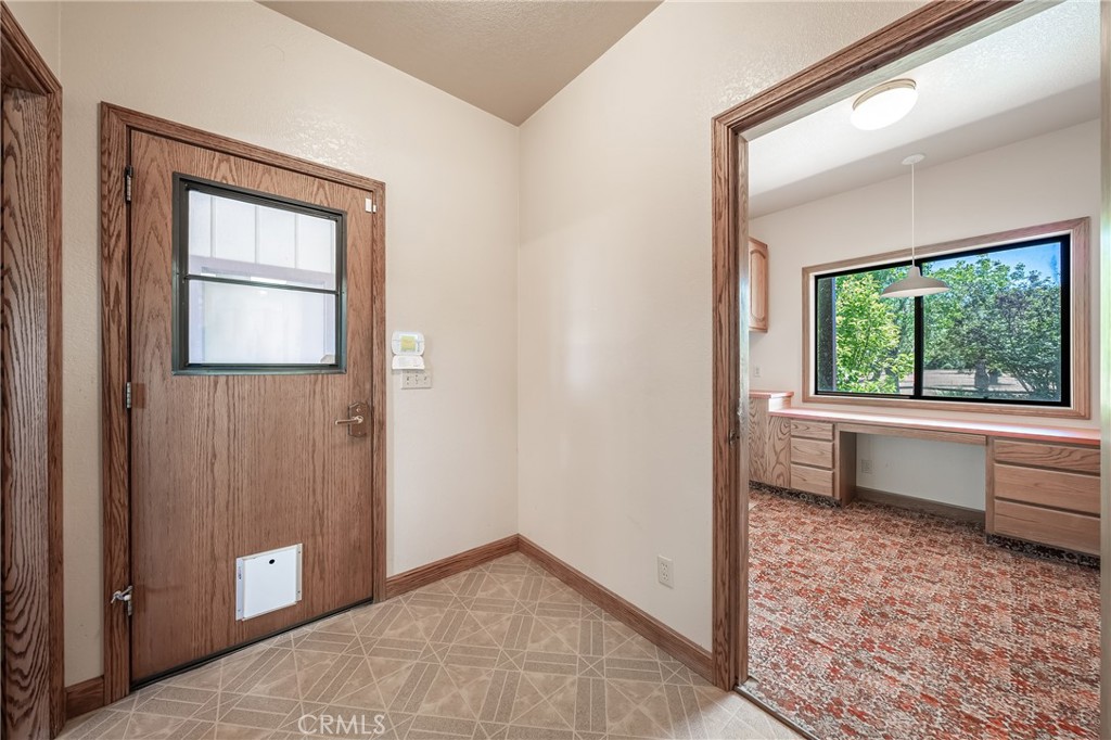 6535 Highland Springs Road Lakeport, CA 95453 - Photo 53 of 75 an empty room with a window and a ceiling fan