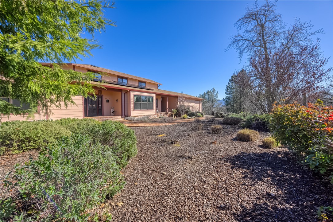6535 Highland Springs Road Lakeport, CA 95453 - Photo 6 of 75 a front view of a house with garden