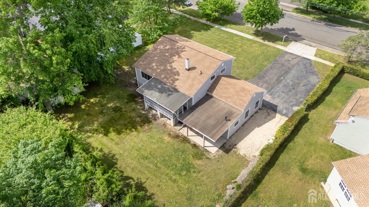 12 Daniel Road Spotswood, NJ 08884 - Photo 26 of 27 an aerial view of a house with a yard