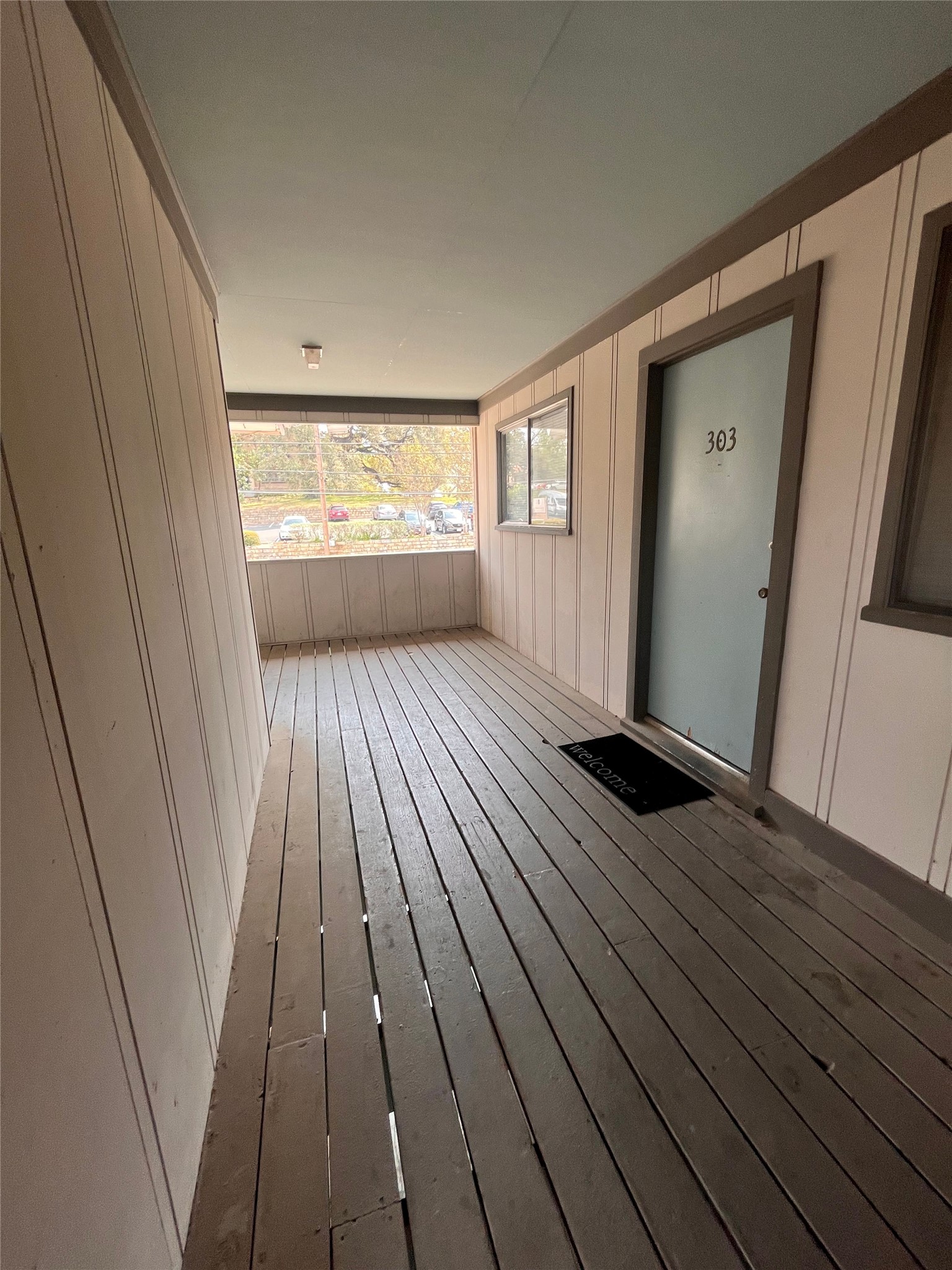 3106 Duval Street, Unit 303 Austin, TX 78705 - Photo 2 of 13 a view of a room with wooden floor