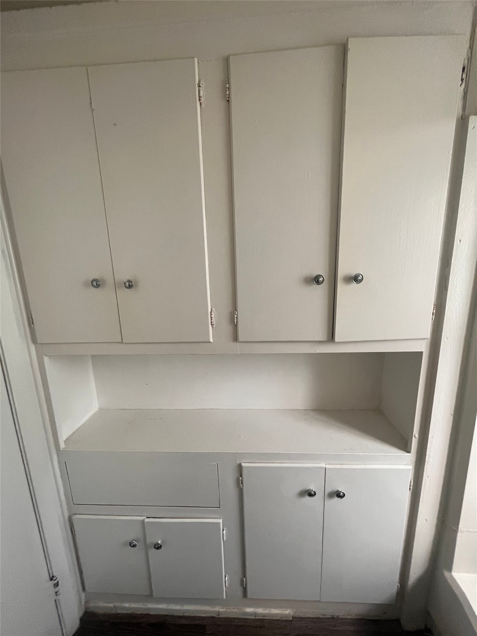 3106 Duval Street, Unit 303 Austin, TX 78705 - Photo 10 of 13 a view of white cabinets