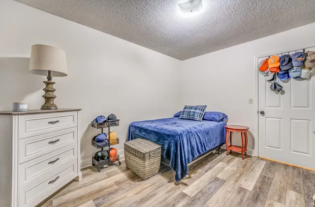 a view of a livingroom with furniture and a ceiling fan