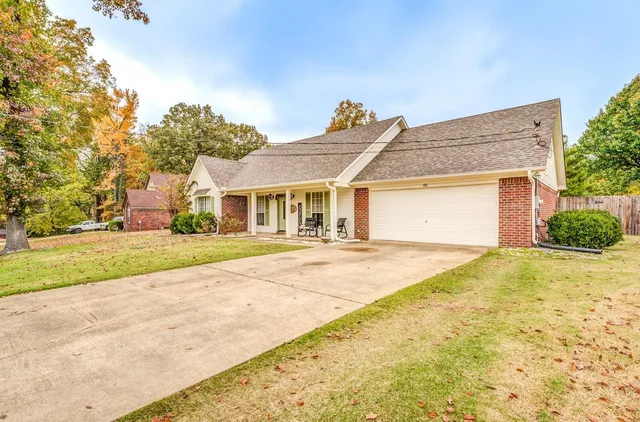 front view of a house with a yard