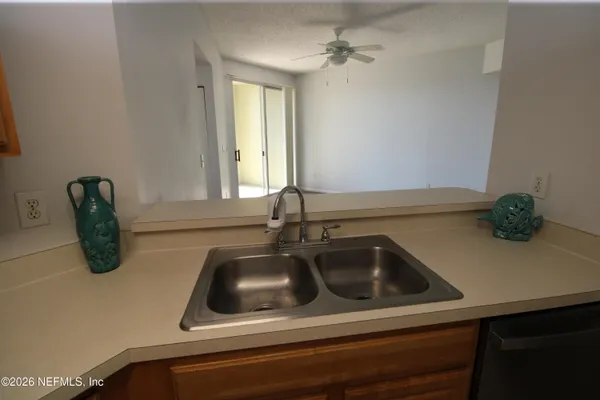 a bathroom with a sink toilet and tub