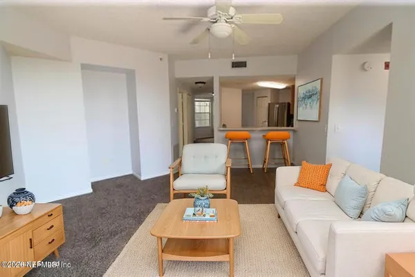 a close view of a sink and dishwasher in kitchen