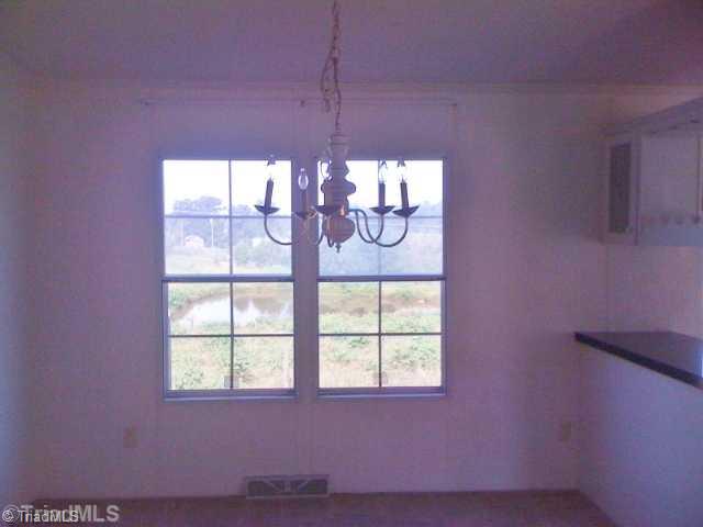 7831 Sylvan Road Snow Camp, NC 27349 - Photo 6 of 11 Dining Room.