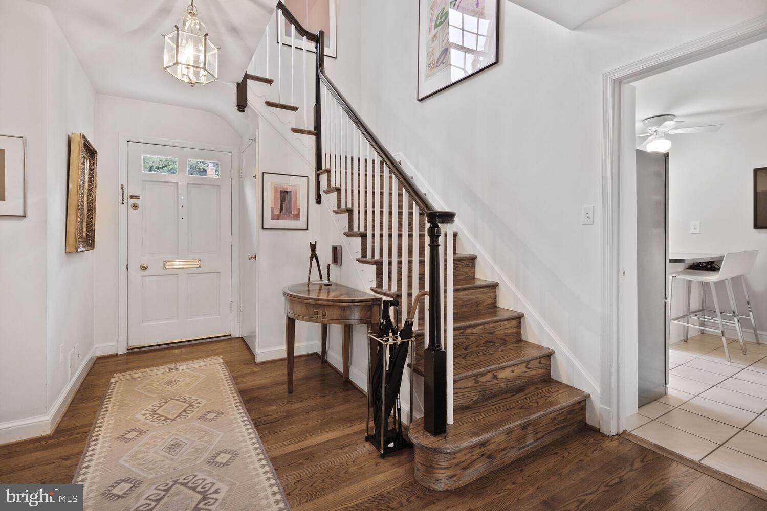 7721 Maryknoll Avenue Bethesda, MD 20817 - Photo 15 of 33 a view of entryway and hall with wooden floor