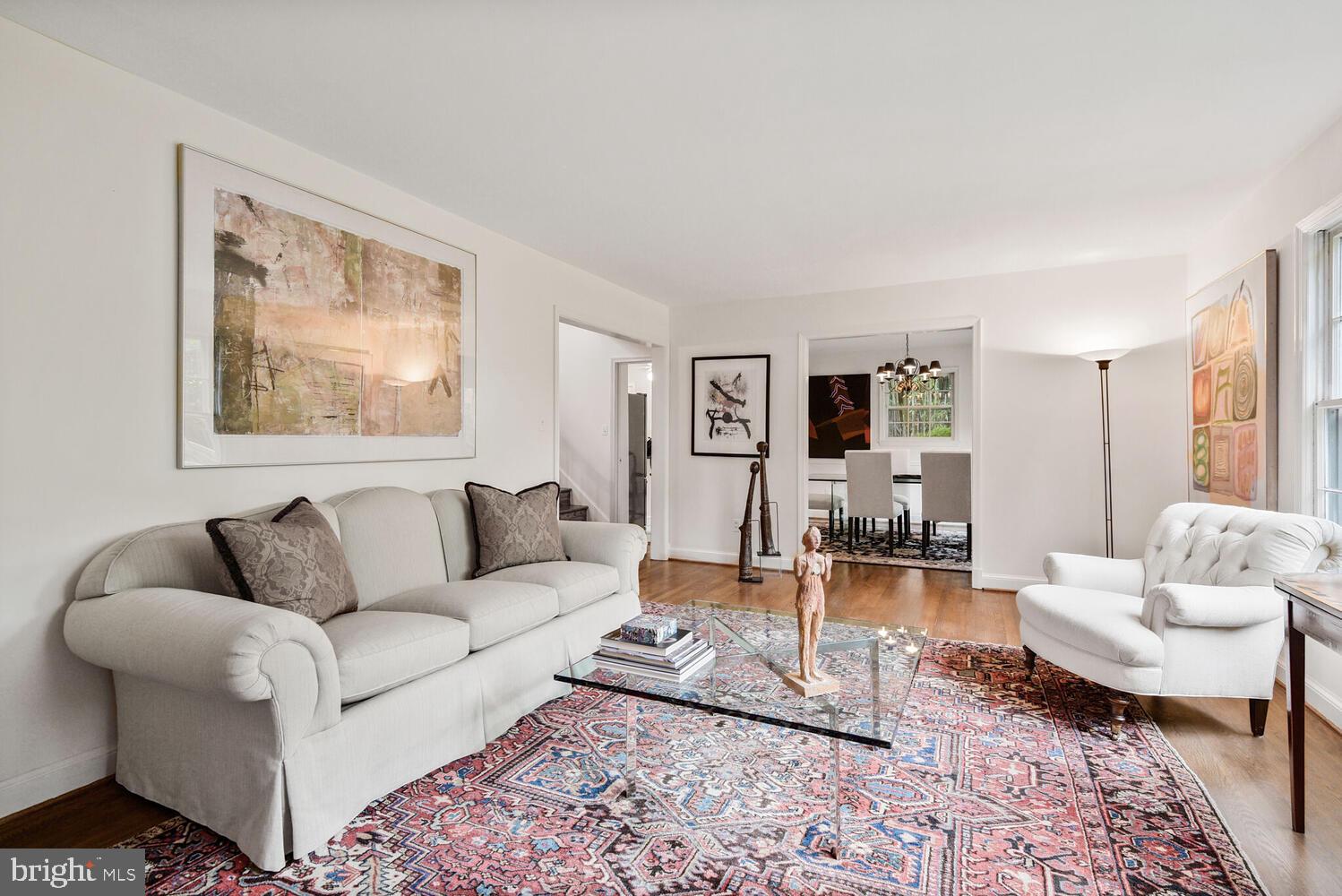 7721 Maryknoll Avenue Bethesda, MD 20817 - Photo 5 of 33 a living room with furniture and a rug