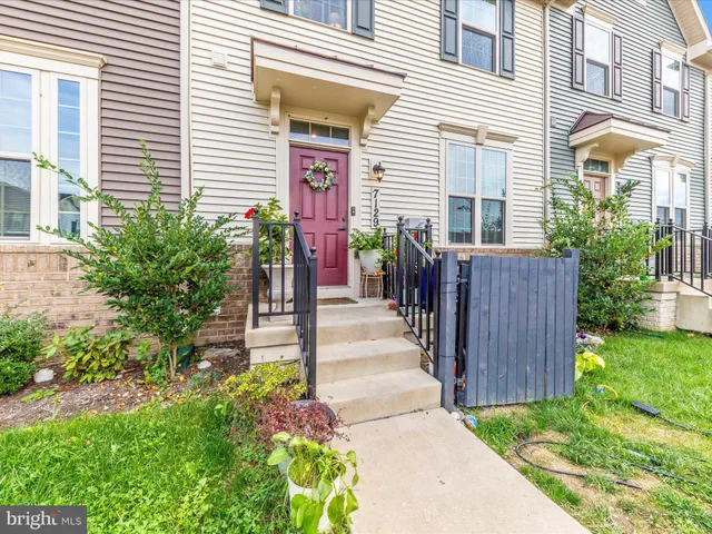 front view of a building with a yard