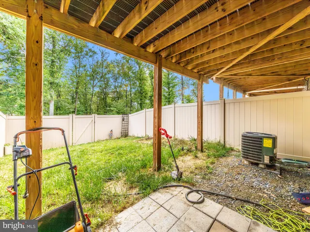 a view of a street with a building in the background