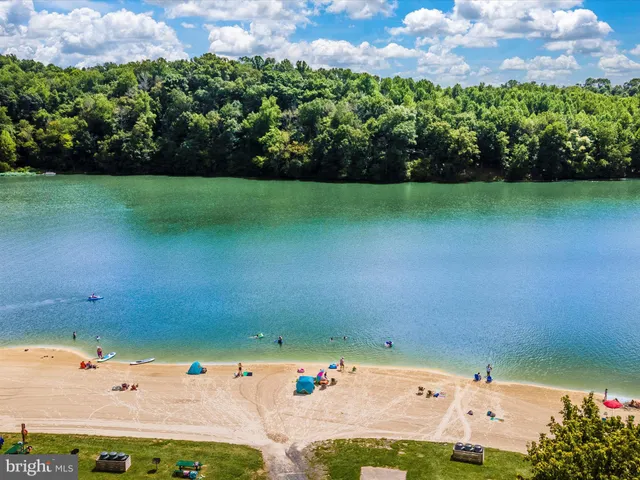 a view of a park with swings and slides