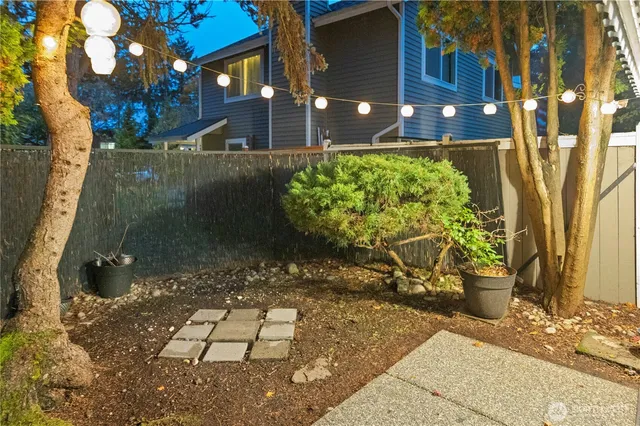 a bathroom with a sink mirror vanity and toilet