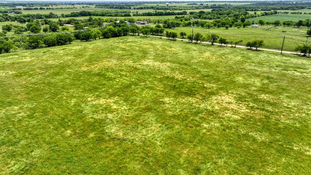1000 Goodnight Trail Perrin, TX 76486 - Photo 6 of 8 a view of an outdoor space and a yard