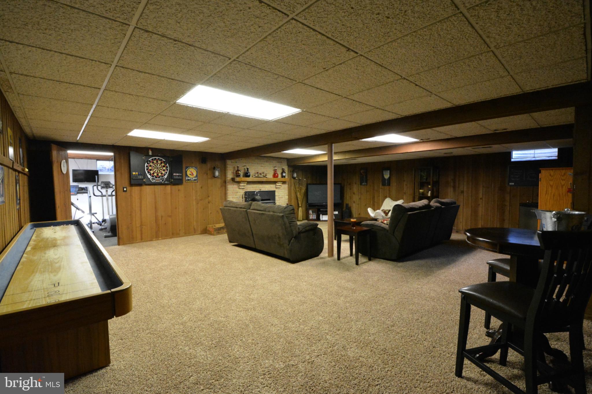 23 Troy Drive Lititz, PA 17543 - Photo 31 of 45 Family Room view to workout area & storage