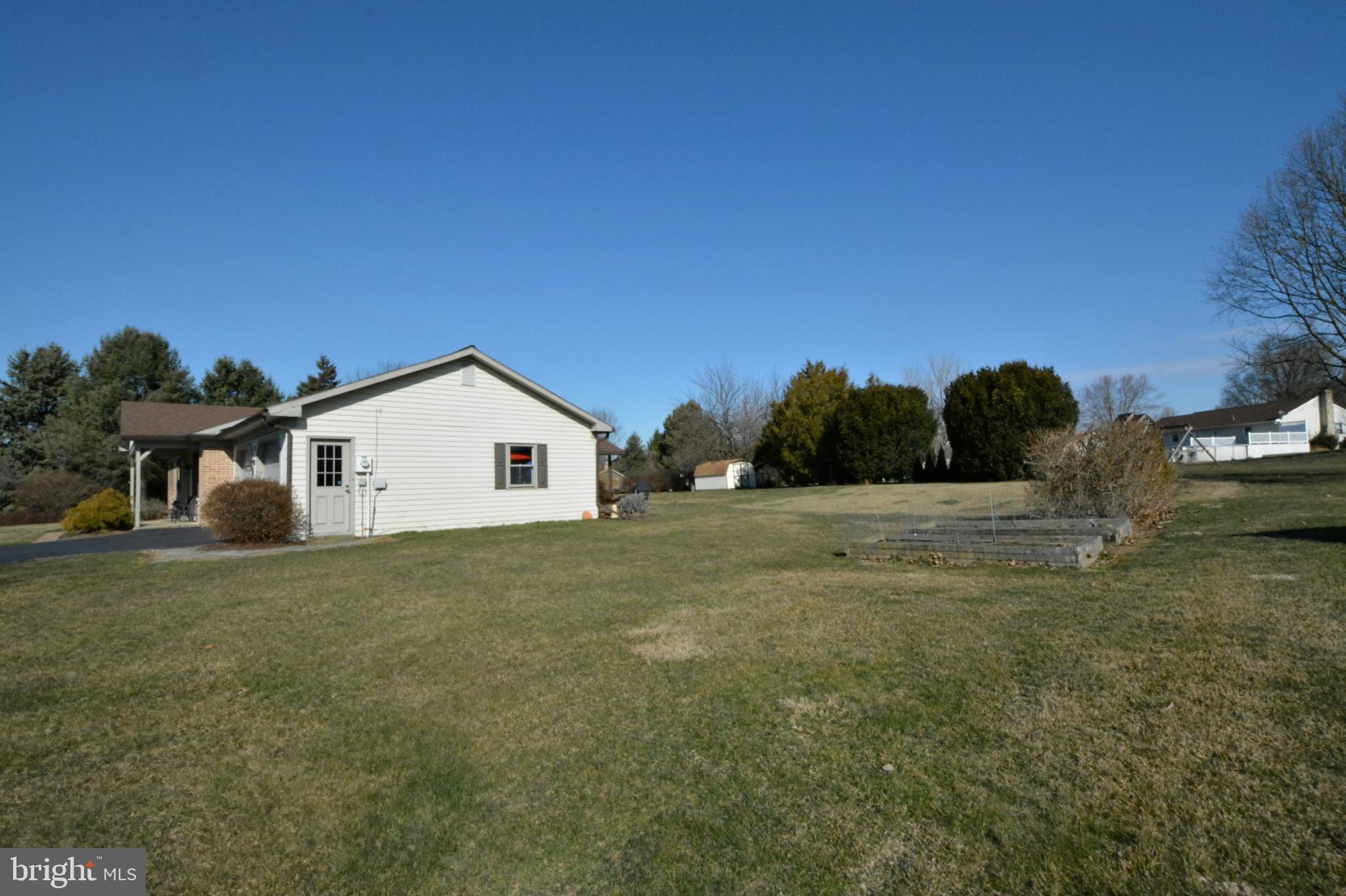23 Troy Drive Lititz, PA 17543 - Photo 41 of 45 Side yard view to garden beds