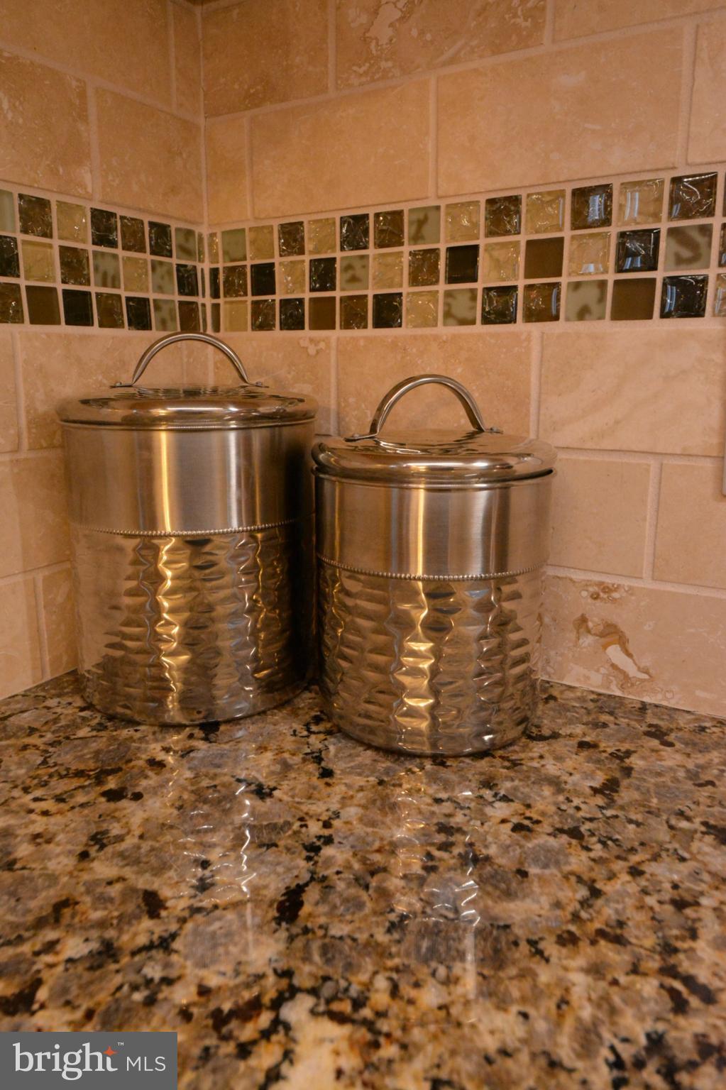 23 Troy Drive Lititz, PA 17543 - Photo 8 of 45 Close up of Tile Backsplash & Granite Counters