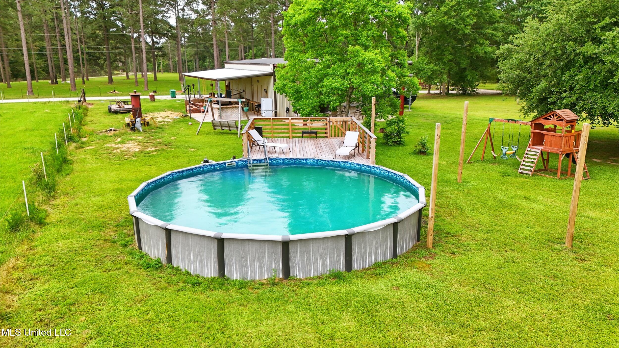12525 Indian Springs Road Picayune, MS 39466 - Photo 7 of 22 6_pool 1