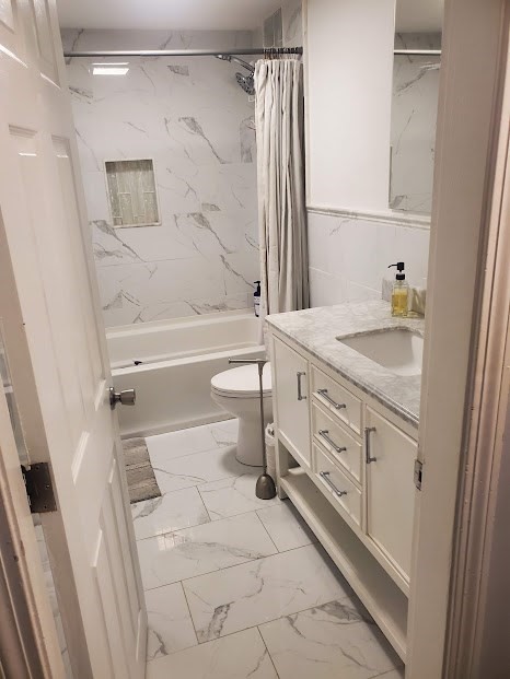 19 Calvin Road Easton, MA 02356 - Photo 8 of 14 a bathroom with a granite countertop sink toilet and shower