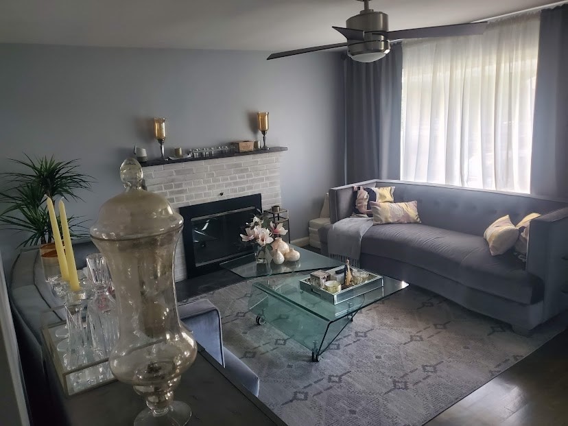 19 Calvin Road Easton, MA 02356 - Photo 9 of 14 a living room with furniture and a fireplace