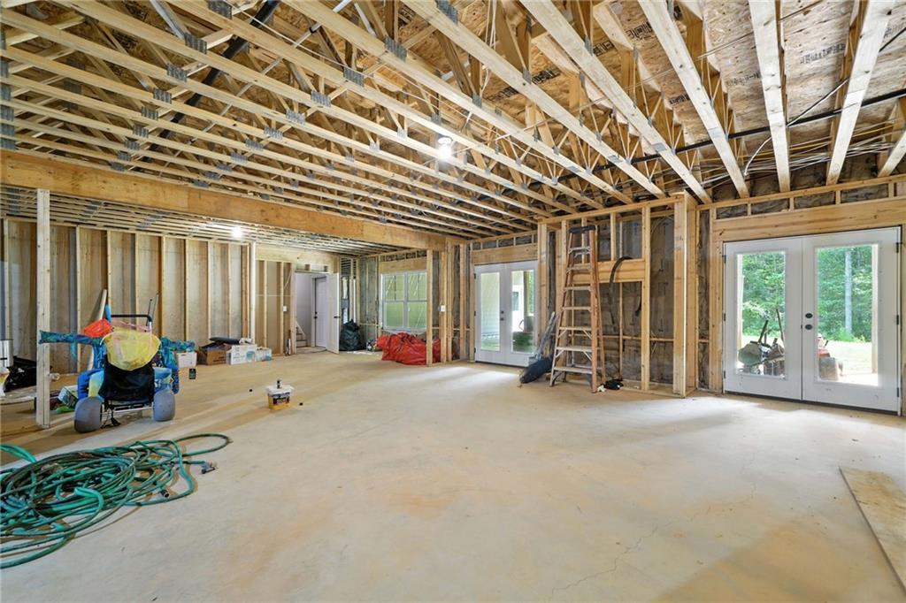 14430 Fincher Road Ball Ground, GA 30107 - Photo 28 of 51 a view of a room with gym equipment