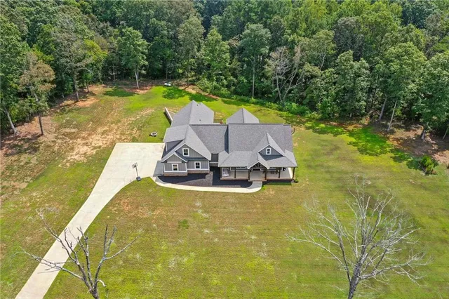 a view of a swimming pool with an outdoor space and seating area