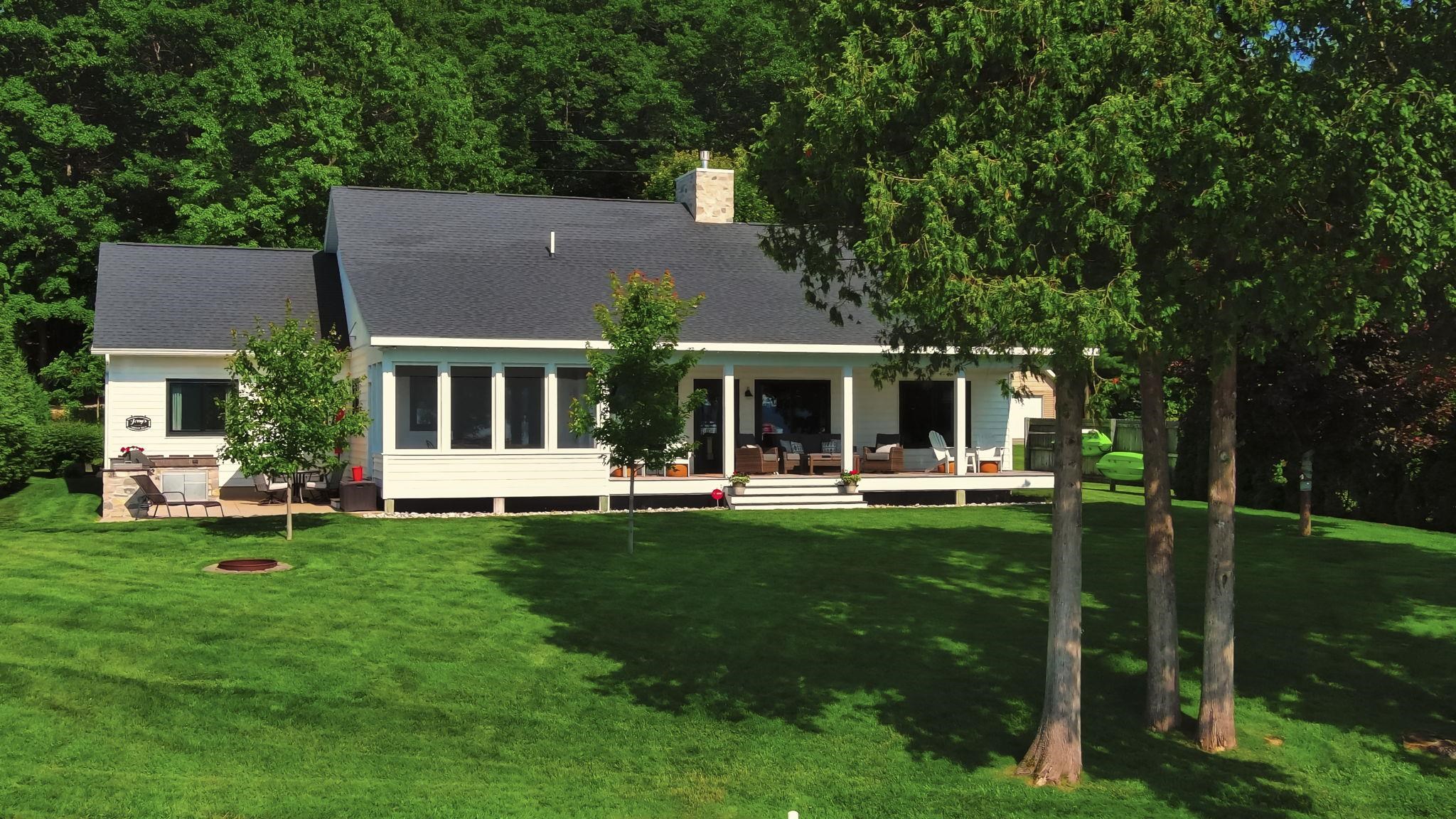 7802 South Lakeview Road Traverse City, MI 49684 - Photo 2 of 72 1937768-452608b5-f001-49b7-9b94-af6859d5969e.JPG