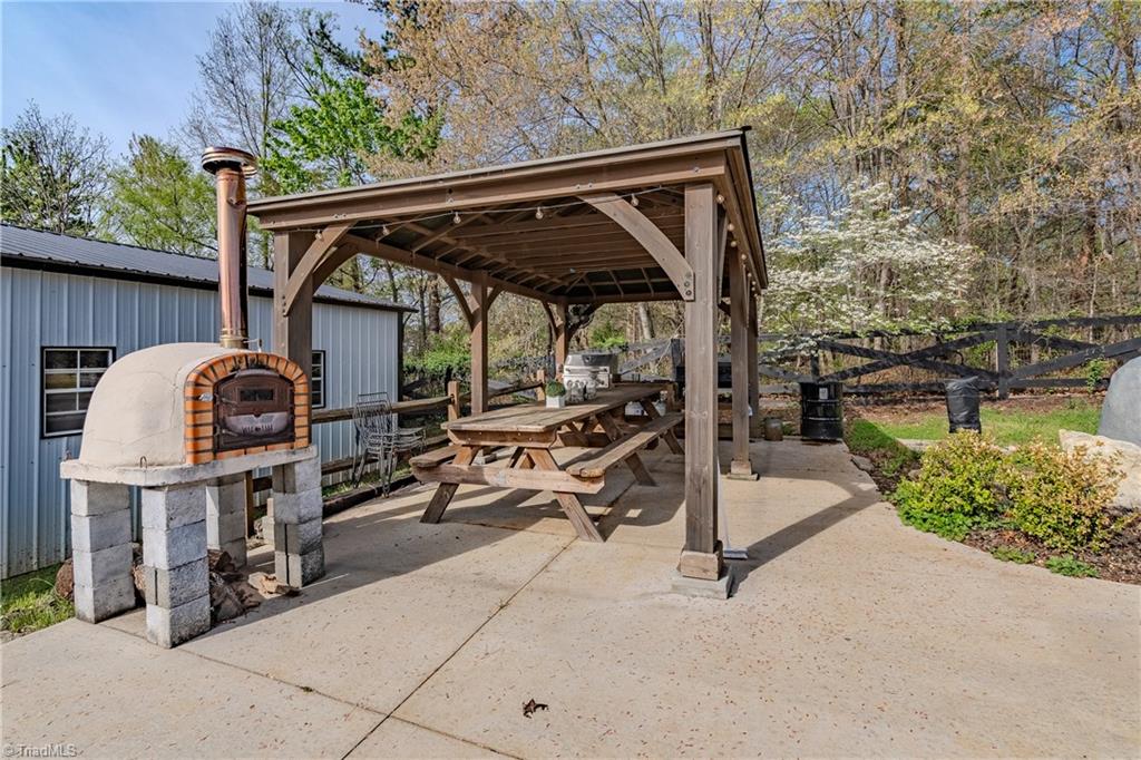 1009 Ray Loop Road Westfield, NC 27053 - Photo 37 of 45 Pizza oven and grill to stay