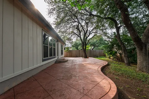 a view of backyard with green space