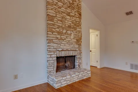 a living room with a fireplace