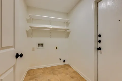 a view of a room with rack on the wall