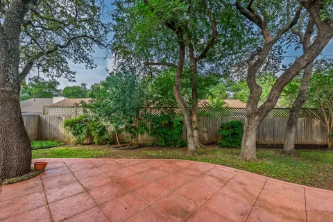 a view of backyard with green space