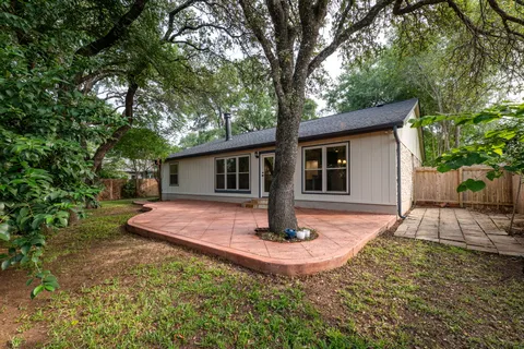 a house view with a garden space