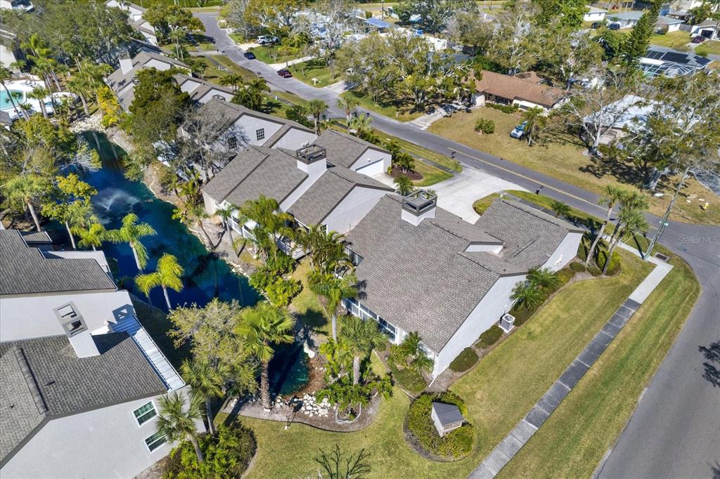 4684 West Huron Road St. Petersburg, FL 33708 - Photo 26 of 31 an aerial view of a house with a yard