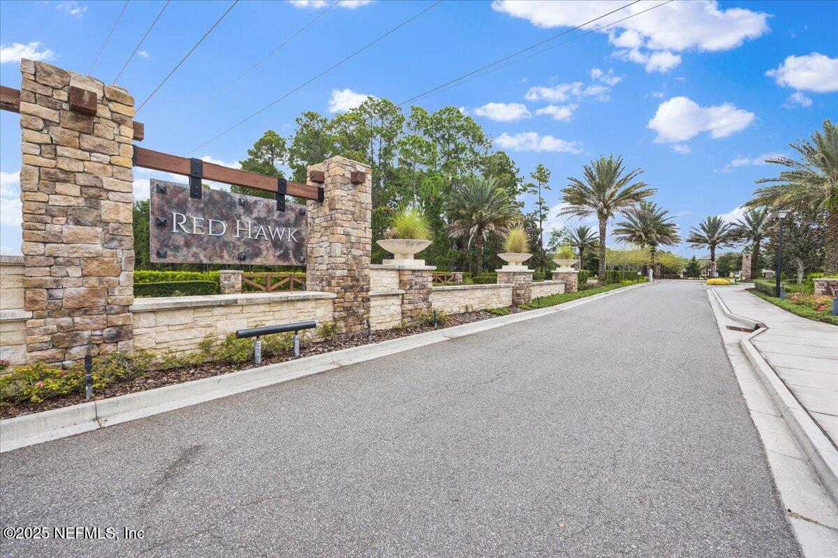 2661 Alexia Circle Jacksonville, FL 32246 - Photo 18 of 22 a view of a street with a building in the background