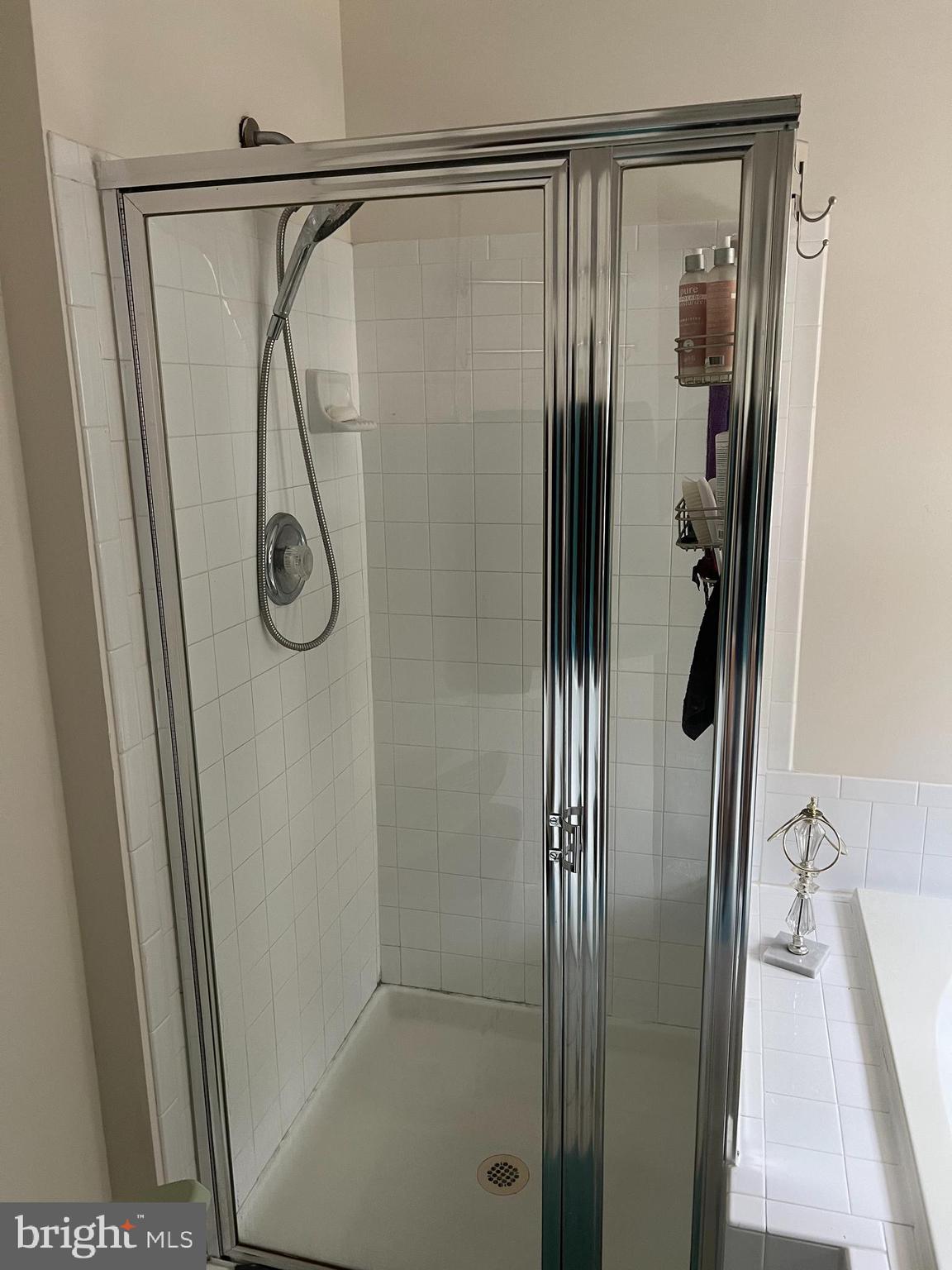 1007 Bohac Lane Accokeek, MD 20607 - Photo 11 of 22 a bathroom with a glass shower door