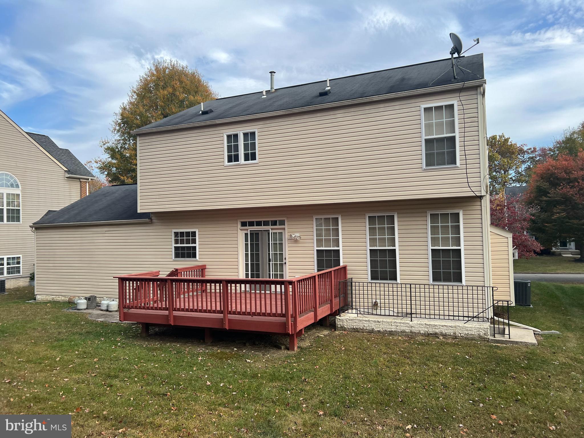1007 Bohac Lane Accokeek, MD 20607 - Photo 2 of 22 a view of a house with a backyard and porch